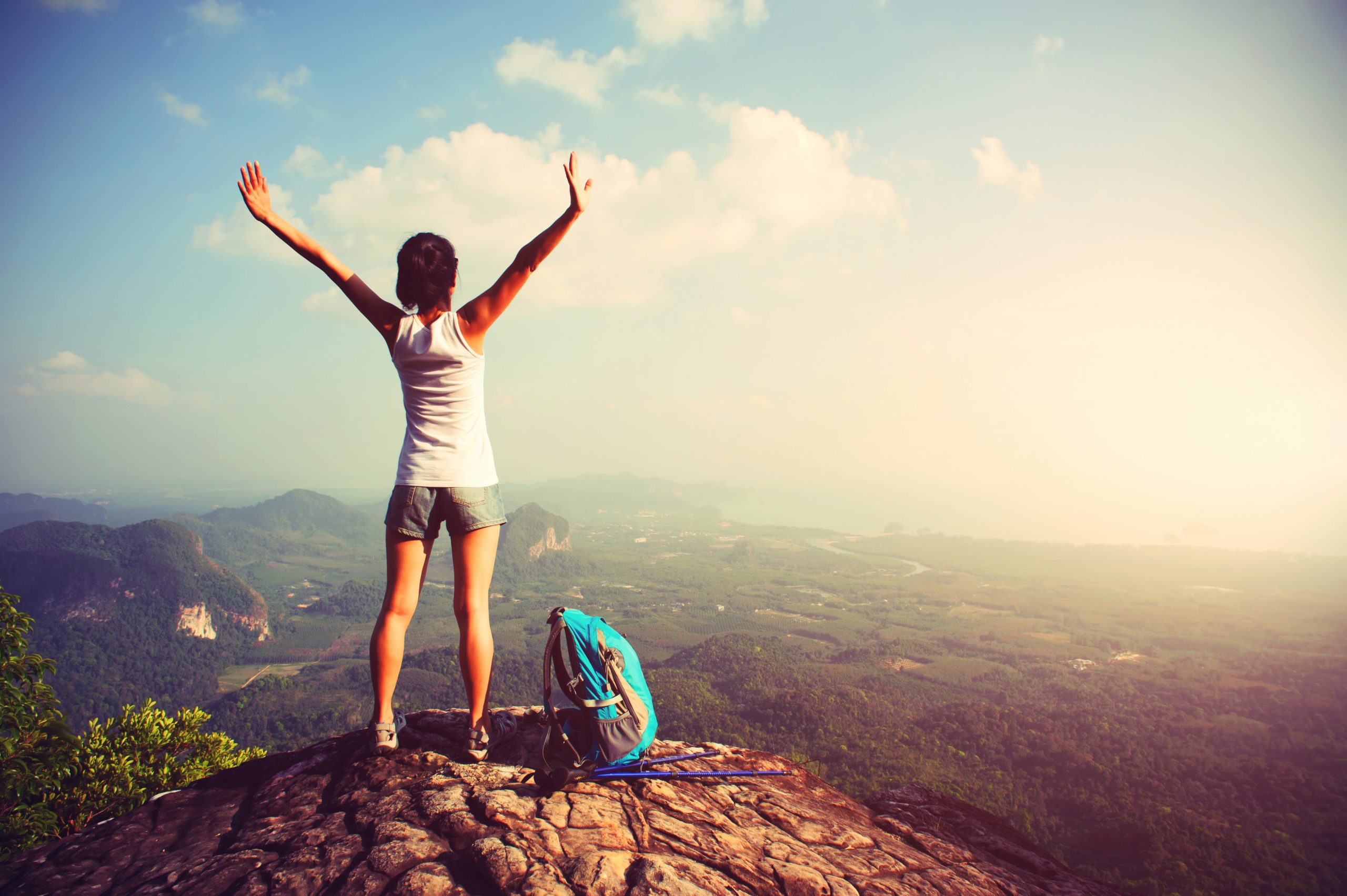 woman on mountain peak